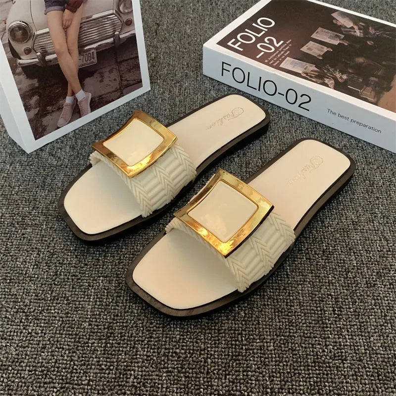 Women's casual flat slipper in apricot colour with a smooth PVC sole.