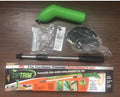 Cordless handheld lawn trimmer with extension pole and protective shield on green grass