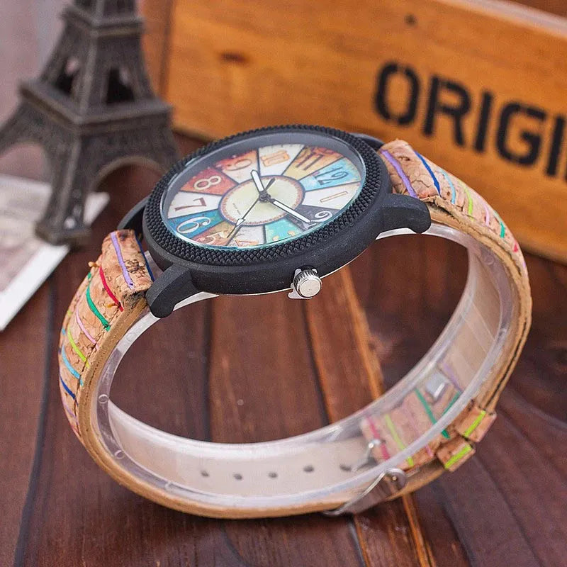 Casual women's wrist watch with leather strap showing 37mm round dial and stainless steel buckle