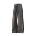 Man's straight-leg fleece-lined casual trousers in black, shown with elastic waistband detail.