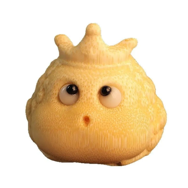 Solid bamboo carving of a Crown Princess Toad ornament with live eye design.