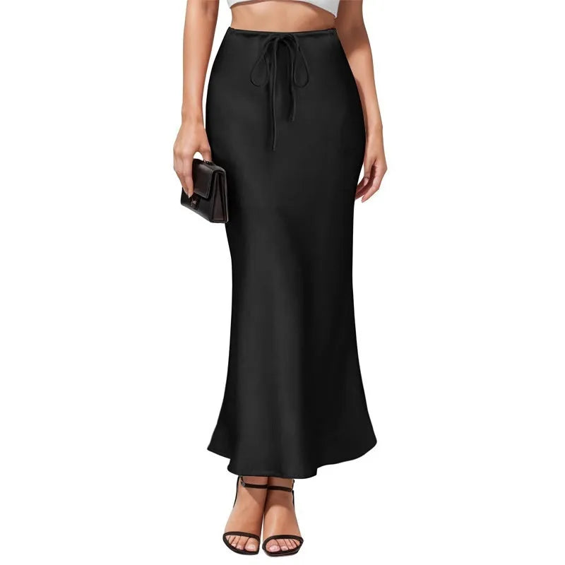 Acetate fabric asymmetric skirt with high waist and irregular stitching in solid colour