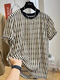 Black men's loose-fitting striped short sleeve pullover top made from silk and linen blend.