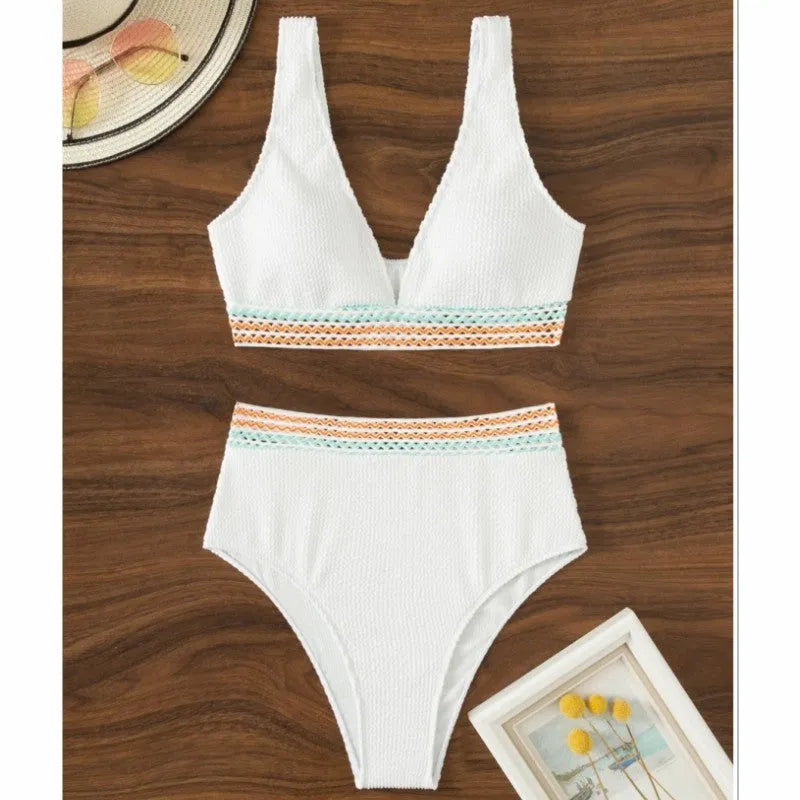 Women's solid colour high-waist split bikini set in white or pink nylon fabric