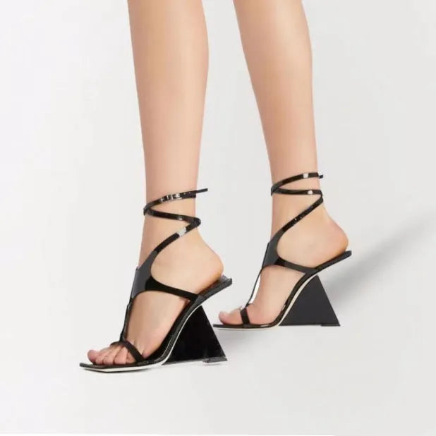 Women's black square toe high heel sandals with ankle strap and 9.5cm heel.