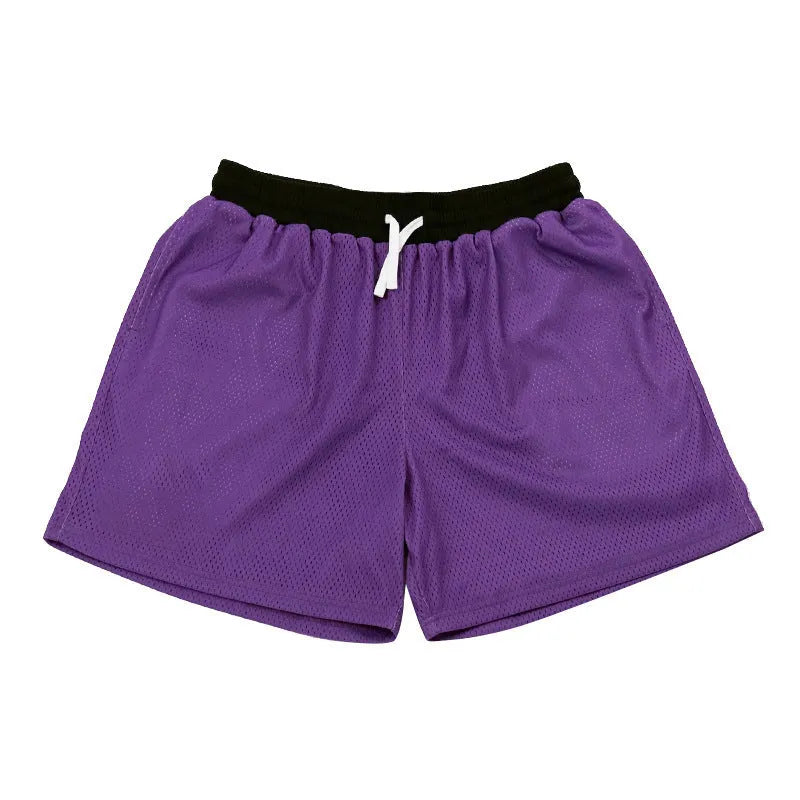 Men's solid colour mesh quick-drying shorts in black, shown laid flat.