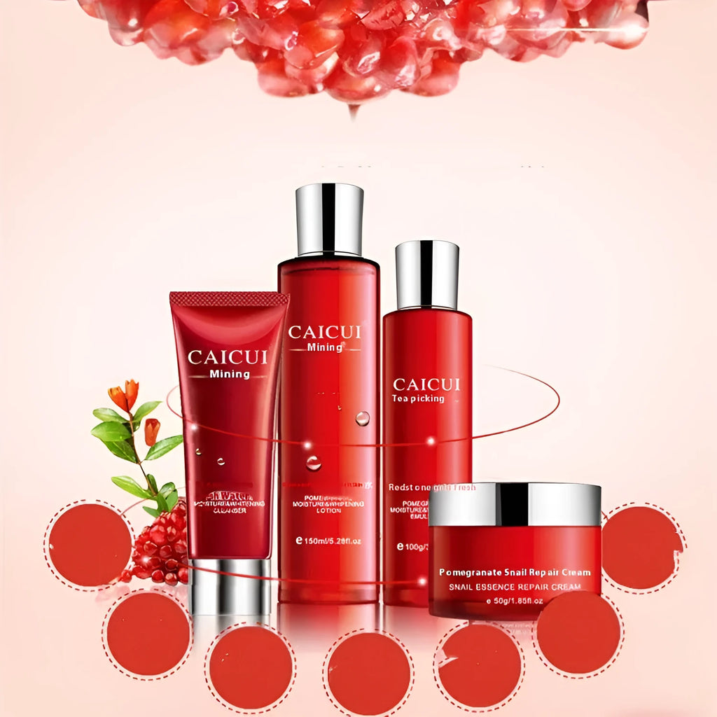 Pomegranate skincare set with four products: face wash, toner, lotion and facial cream in red packaging