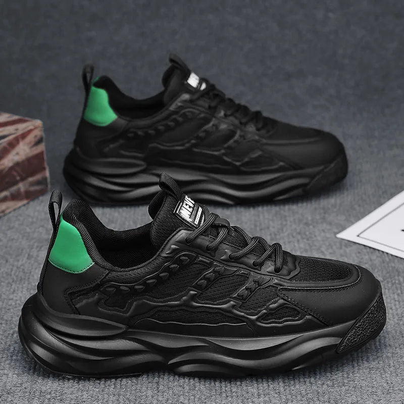 Men's solid colour casual shoes with breathable mesh upper in black or white.
