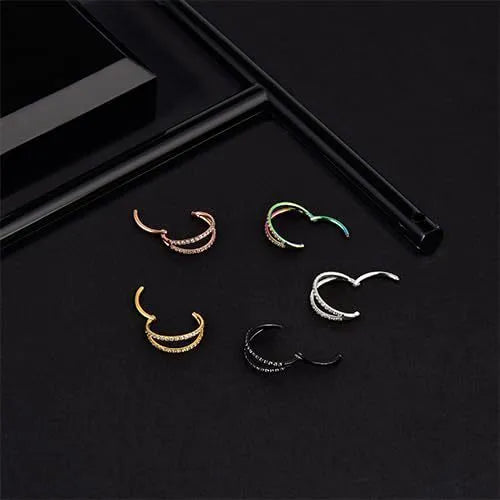 Close-up of a G23 titanium alloy nose ring with a monoclinic diamond finish, shown in steel colour and gold colour options.