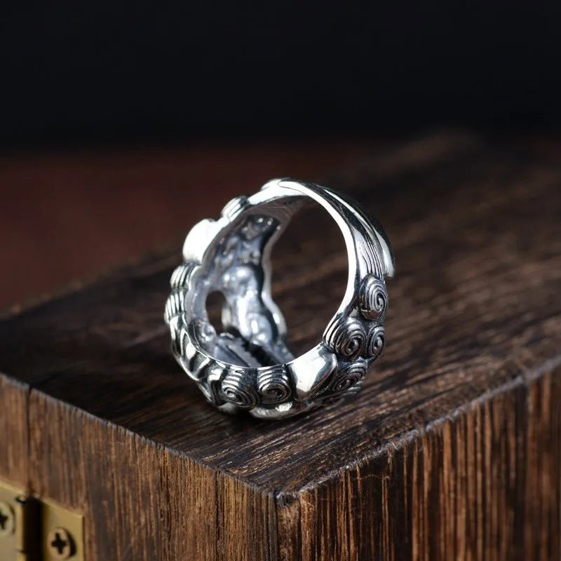 Sterling silver open ring with detailed Domineering Diamond and Jibeast animal pattern.