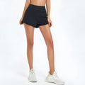 Women's high-waisted quick-drying nylon sports shorts in black, white and water blue colours