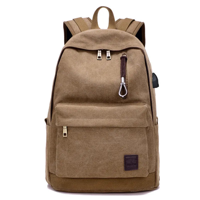 Canvas backpack with USB charging port shown in coffee colour, featuring a laptop compartment and multiple pockets.