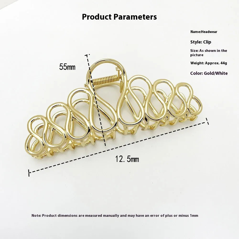 Large minimalist hair clip for updo hairstyles in gold electroplated alloy with tassel accents