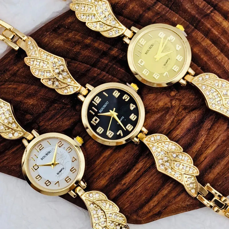 Women's stainless steel watch with round dial on wrist, showing gold face colour option and vachette clasp.
