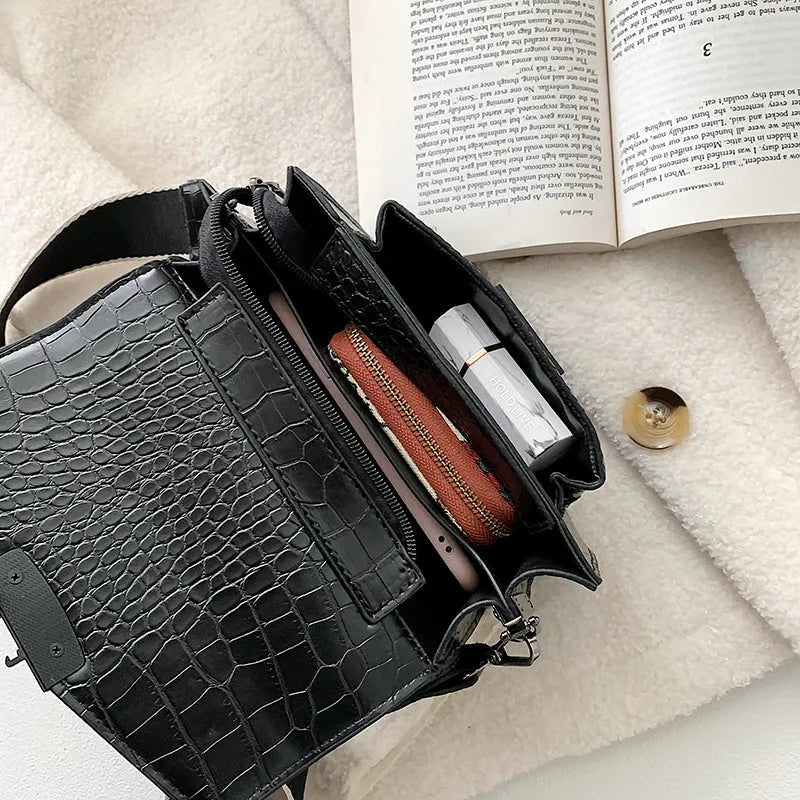 Vintage style crossbody bag in PU material showing 20cm width with four colour options