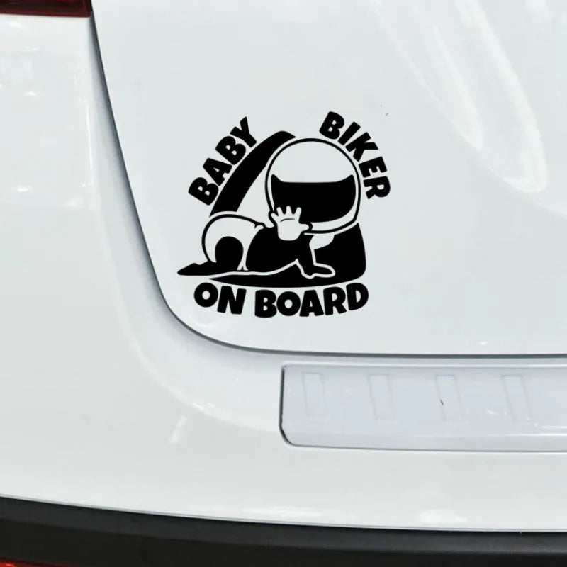 Black and white reflective Baby On Board vinyl car sticker measuring 14.5 by 15 centimetres.