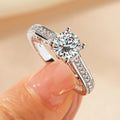Women's zircon ring with electroplated K white or K yellow finish in geometric design with round elements