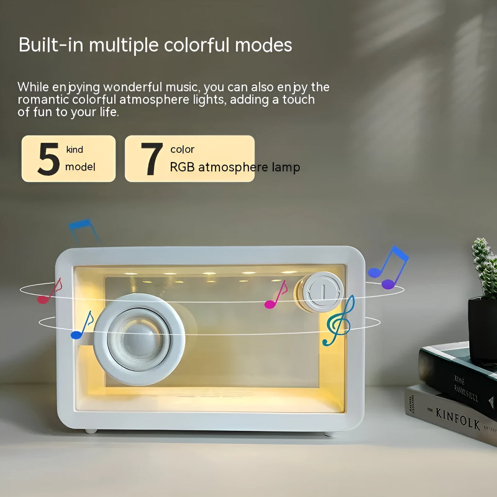 Transparent glass creative Bluetooth speaker in black on a desk with USB cable nearby