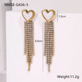 Gold-coloured stainless steel earrings with geometric heart, star, and tassel designs on a white background.
