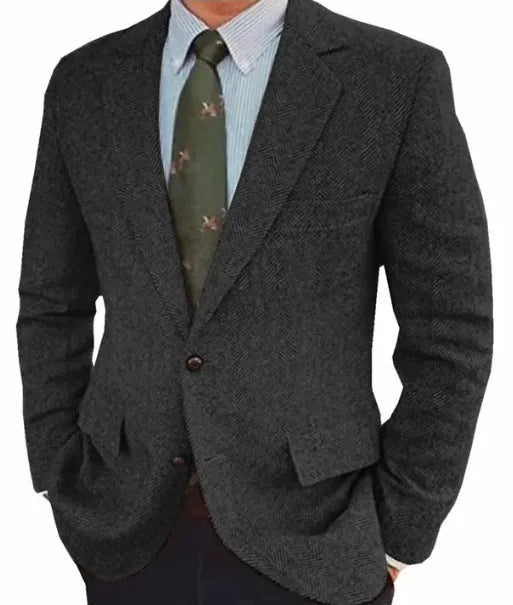 Man wearing a brown herringbone pattern retro suit jacket with a long sleeve cut.