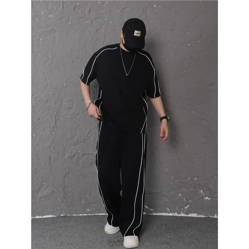 Summer women's sporty casual two-piece set in black suit with colour-blocking trim, short sleeve top and long pants