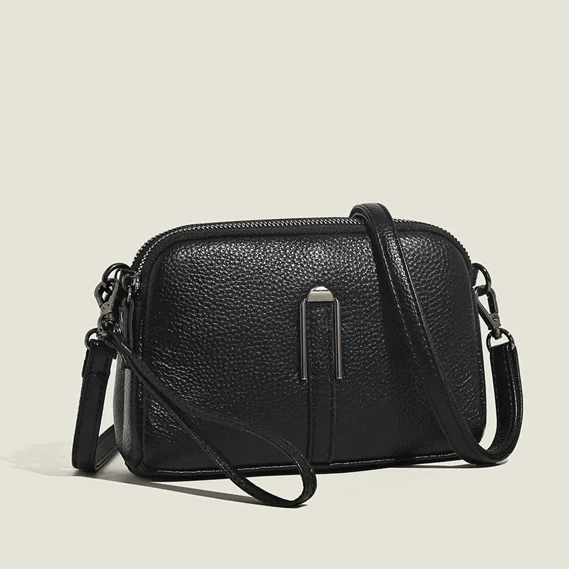 Genuine leather women's square shoulder bag in urban style, dimensions 19cm by 13cm by 6cm
