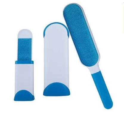 Blue reusable pet hair removal brush with sticky flannel head placed in its self-cleaning base.