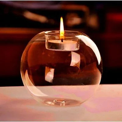 Handmade European style round hollow glass candle holder in three sizes.