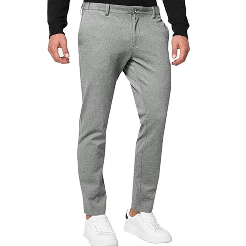 Men's slim-fit tapered chino trousers in a cotton blend fabric shown in a solid colour.