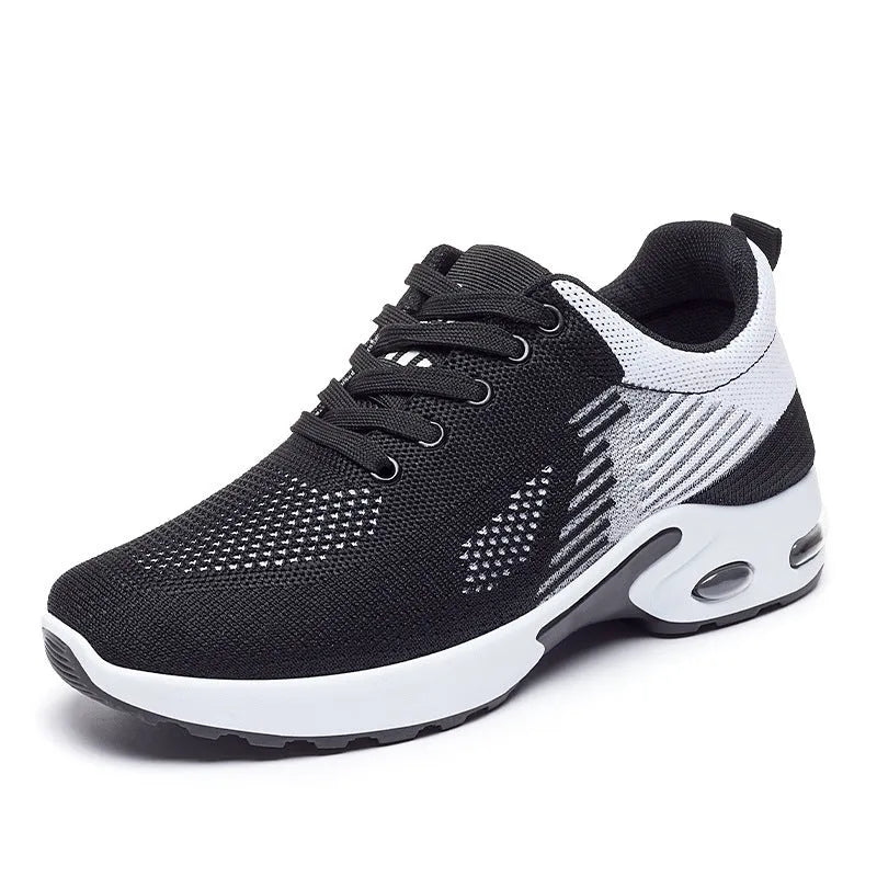 Women's striped Flyknit casual running shoes in pink with a round toe and flat PVC sole.