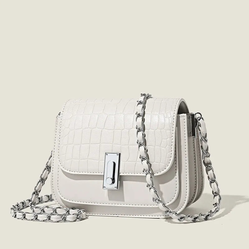 Women's black PU leather crossbody shoulder bag showing horizontal square shape and outer sandwich pocket