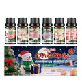 Christmas essential oil set showing six 10ml bottles with different festive scents including Gingerbread and Christmas Cake