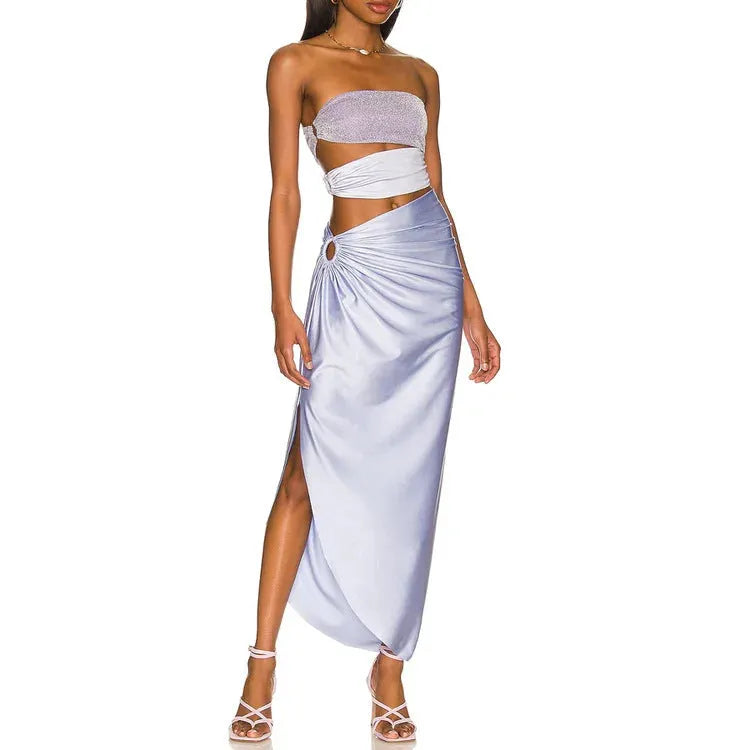 Purple one-piece swimsuit with matching wrap skirt set on mannequin