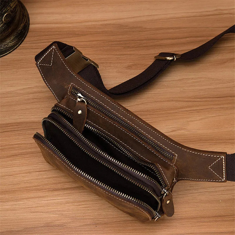 Brown cowhide leather men's waist bag with adjustable strap and zip closure
