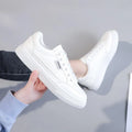 Korean-style white and brown low-top sneakers with artificial PU uppers and plastic soles
