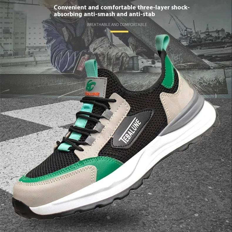 Black and green men's safety shoes with a mesh upper and plastic steel toe cap on a white background.