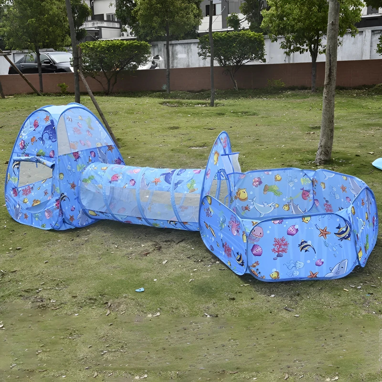 Children's three-in-one indoor play tent set with cartoon submarine design, featuring a tent, play tunnel, and ball pool.