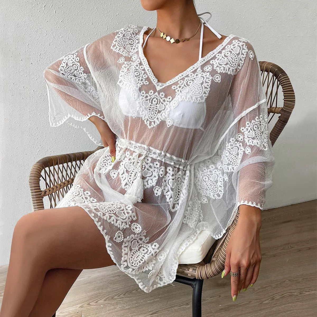 White women's beach blouse with free size fit for swimming and sun protection