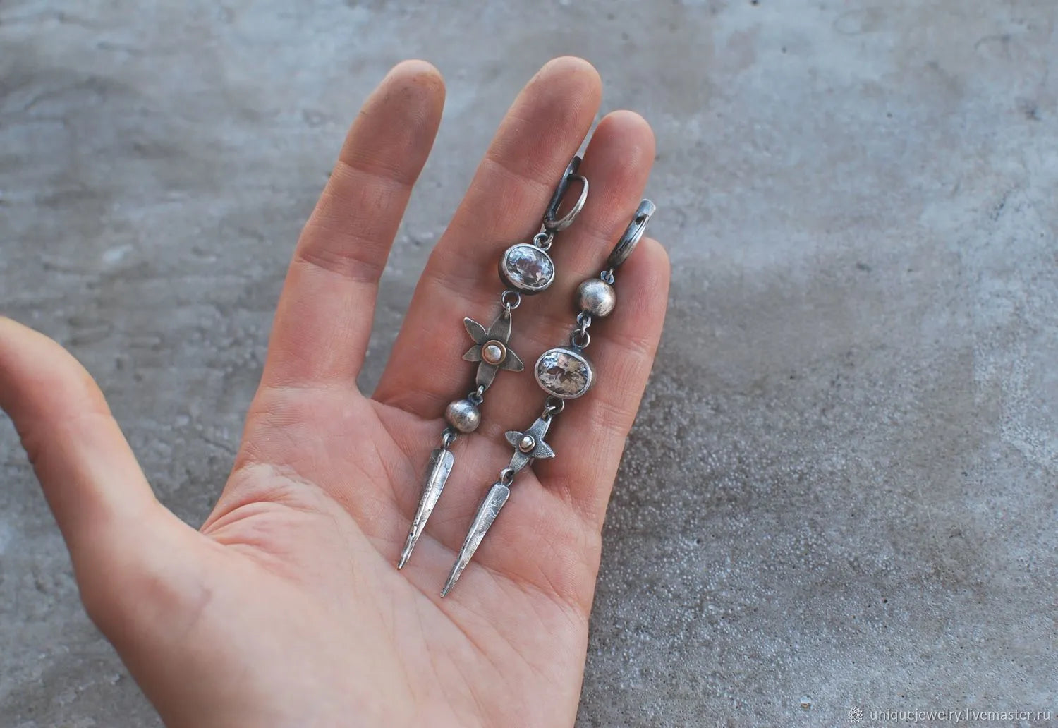 Geometric xingx design pendant earrings with rhinestone accents in antique silver finish