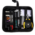 Black plastic case of guitar repair tool kit with metal components for instrument maintenance.