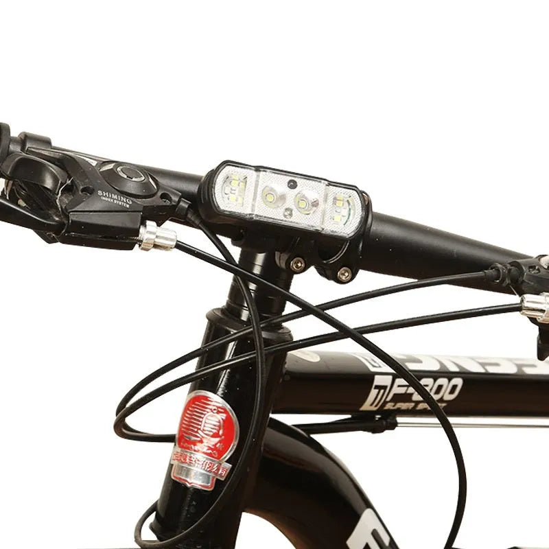 Black ABS bicycle headlight with LED lamp and rechargeable battery for cycling