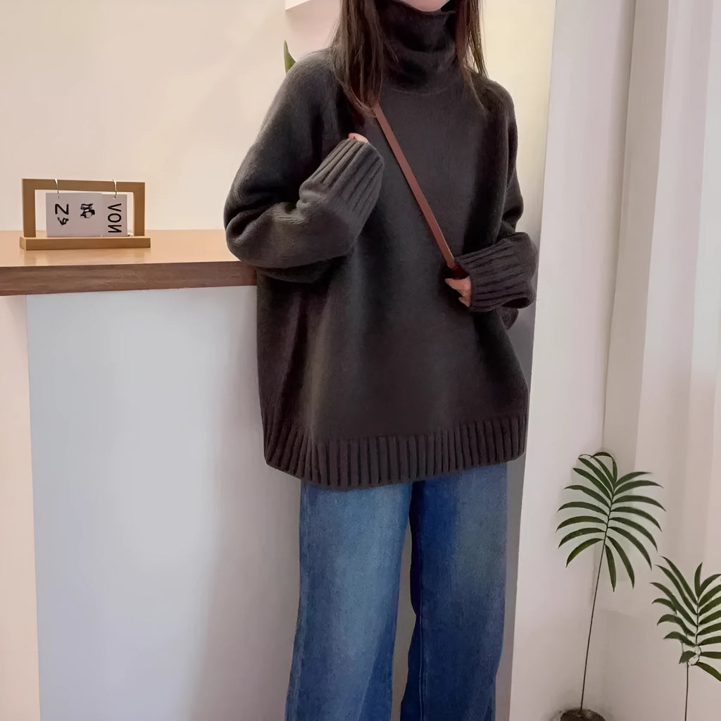 Women's loose turtleneck sweater with thick curling pile collar in solid colour