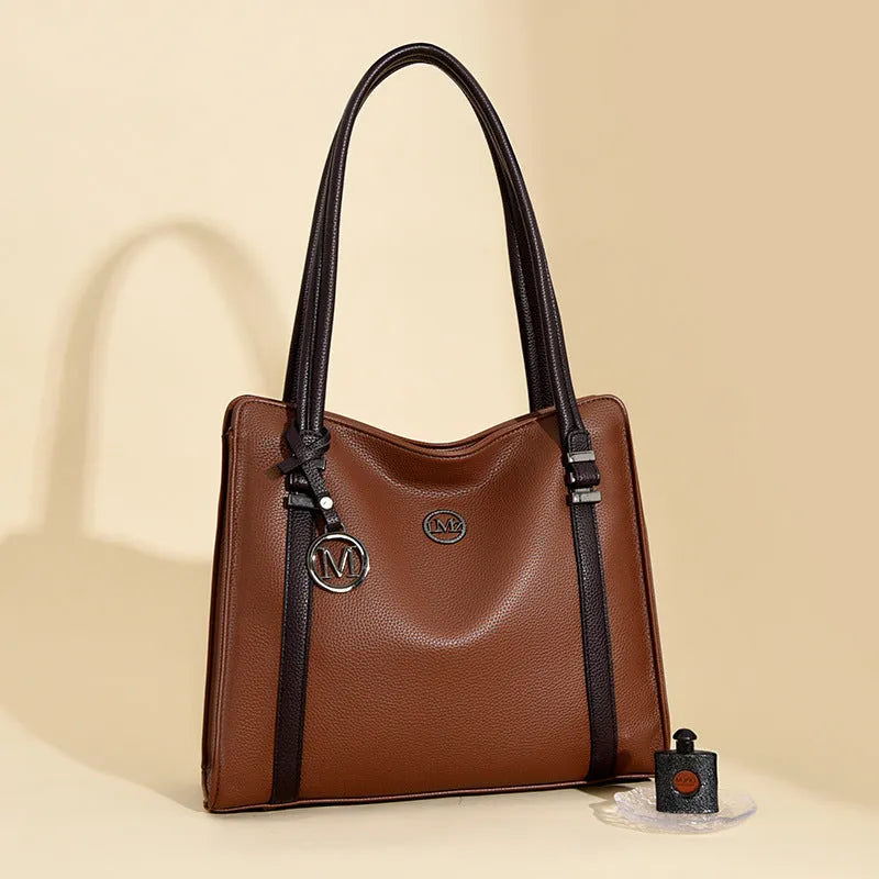 Genuine leather women's crossbody bag in retro style showing horizontal square shape and double shoulder straps.