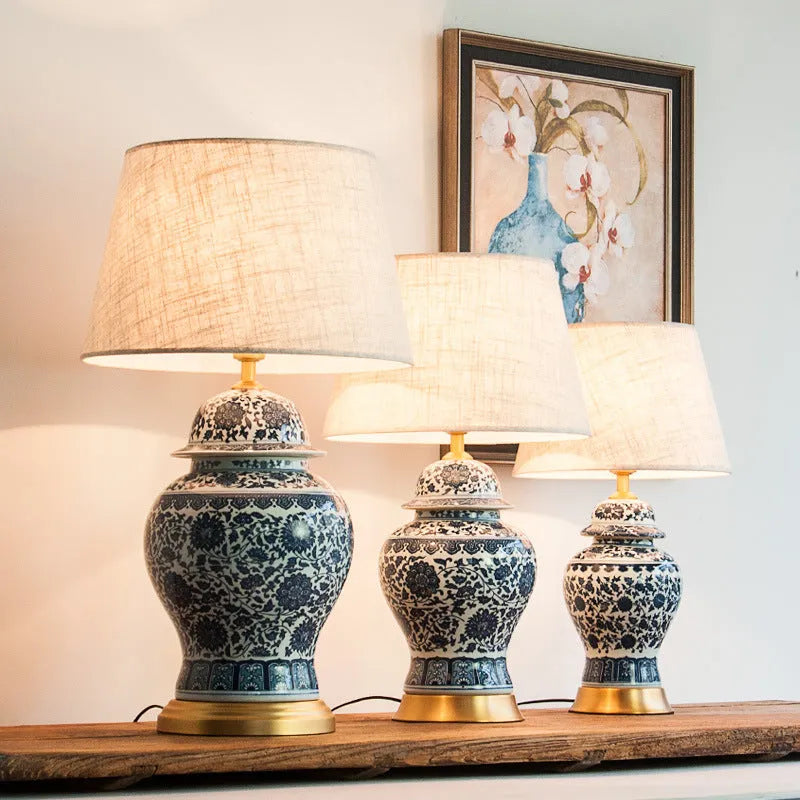 Blue and white porcelain Chinese table lamp with ceramic base and cloth shade