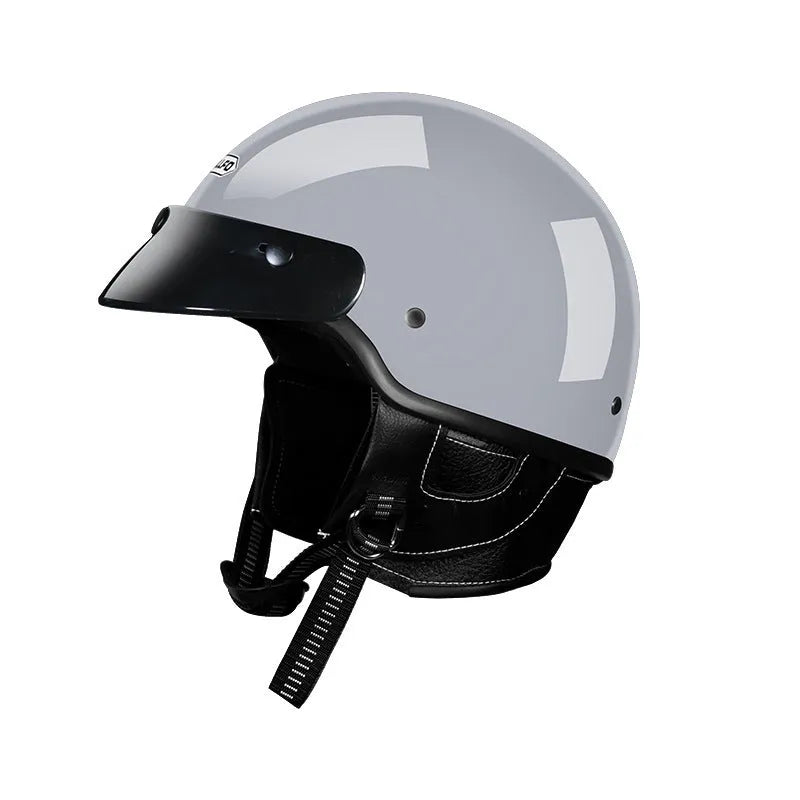 Retro style motorcycle helmet in ABS shell, shown in cement grey colour.