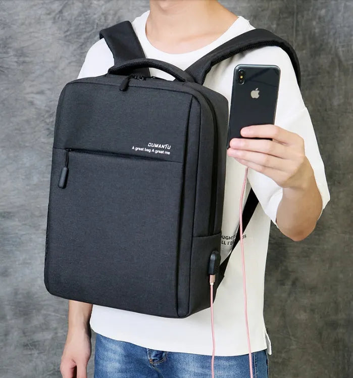 Black waterproof Oxford cloth laptop backpack with shoulder straps for a 15.6-inch device.