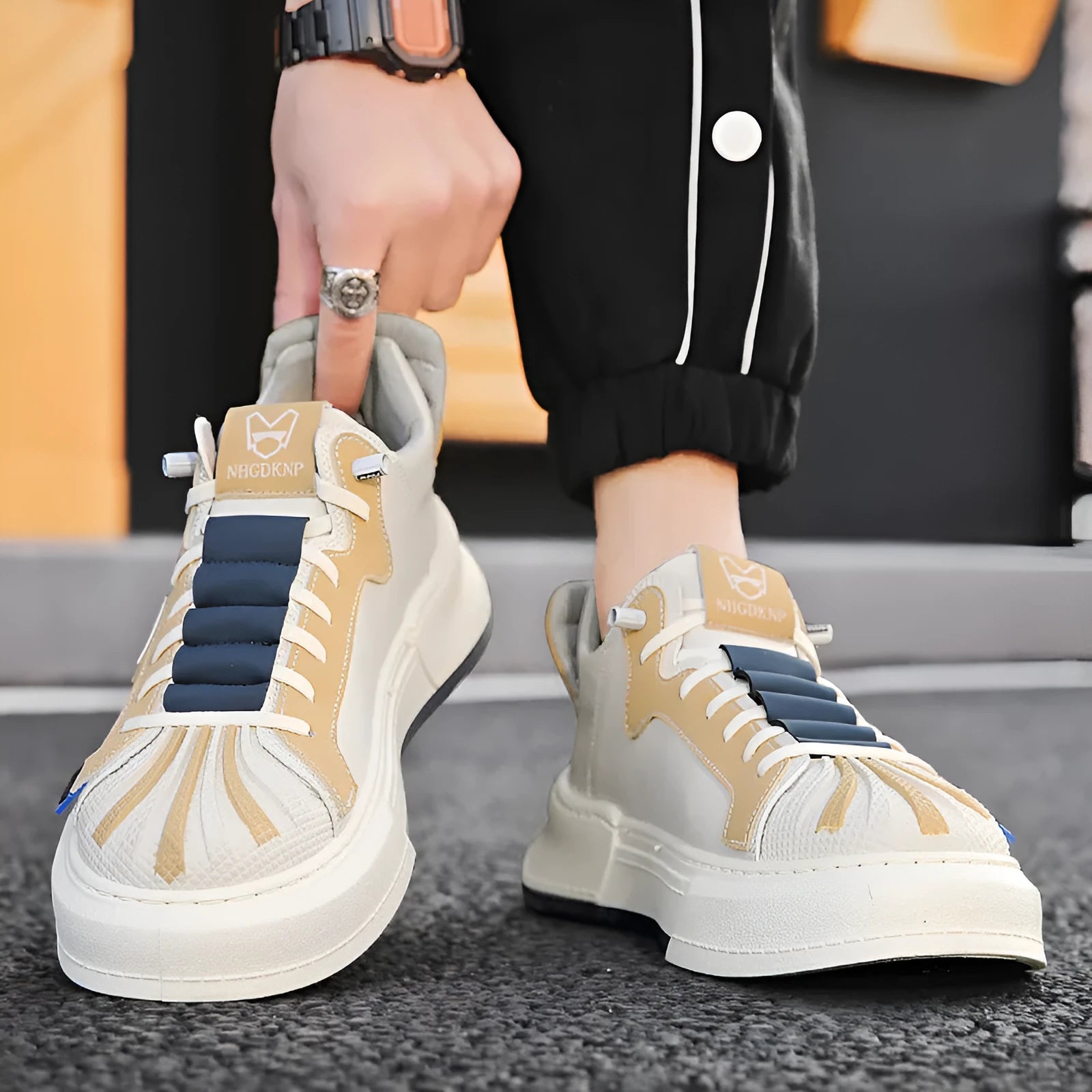 Men's beige low-top sneakers with elastic band closure and mesh lining