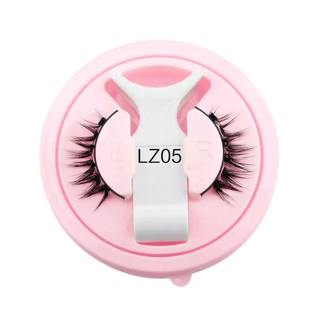 Set of reusable waterproof glue-free false eyelashes in natural thick styles on a clear background.