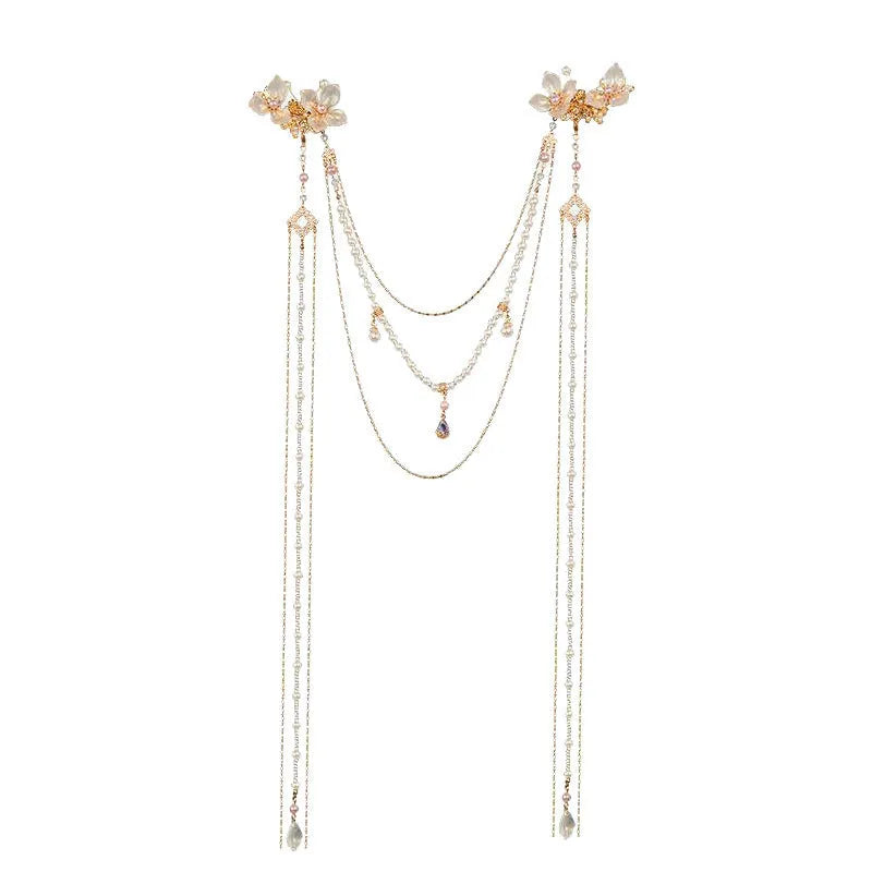 Gold women's hairpin with pearl, diamond and flower design featuring long tassel decoration