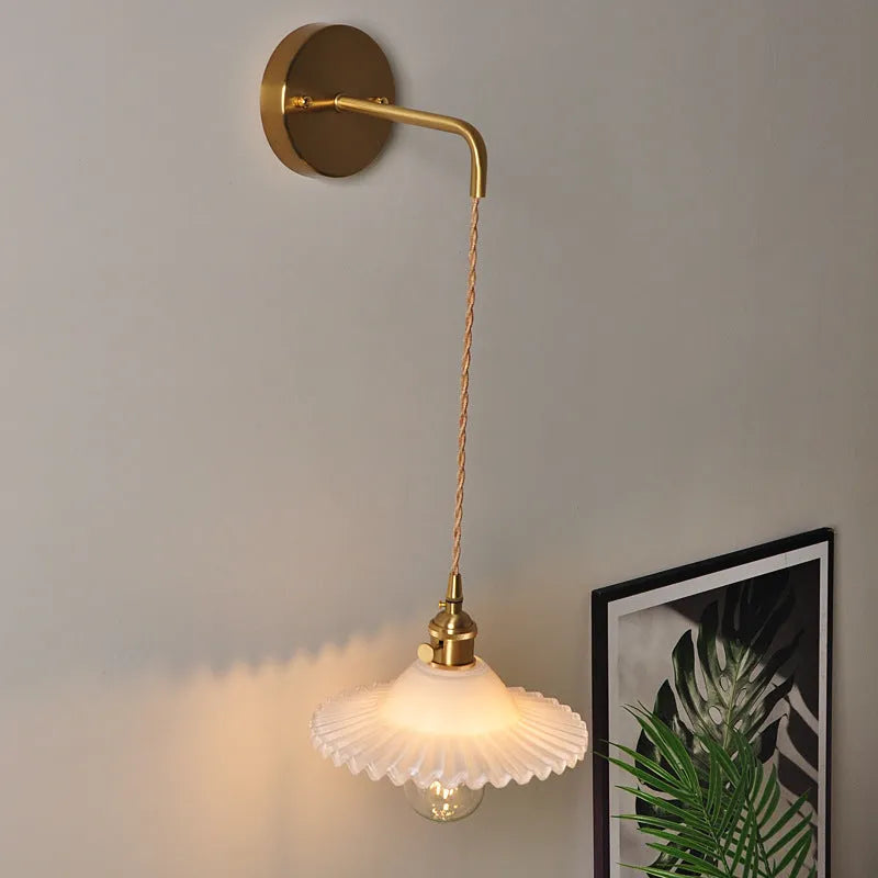 Retro brass lotus wall lamp with copper body and glass shade in six colour options